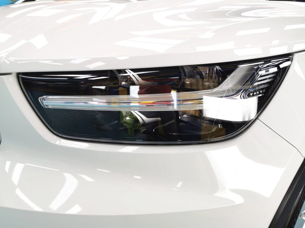 The XC40's coated paintwork showing clean reflections.