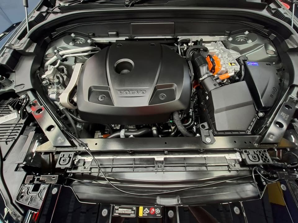 Engine bay with the engine cover.