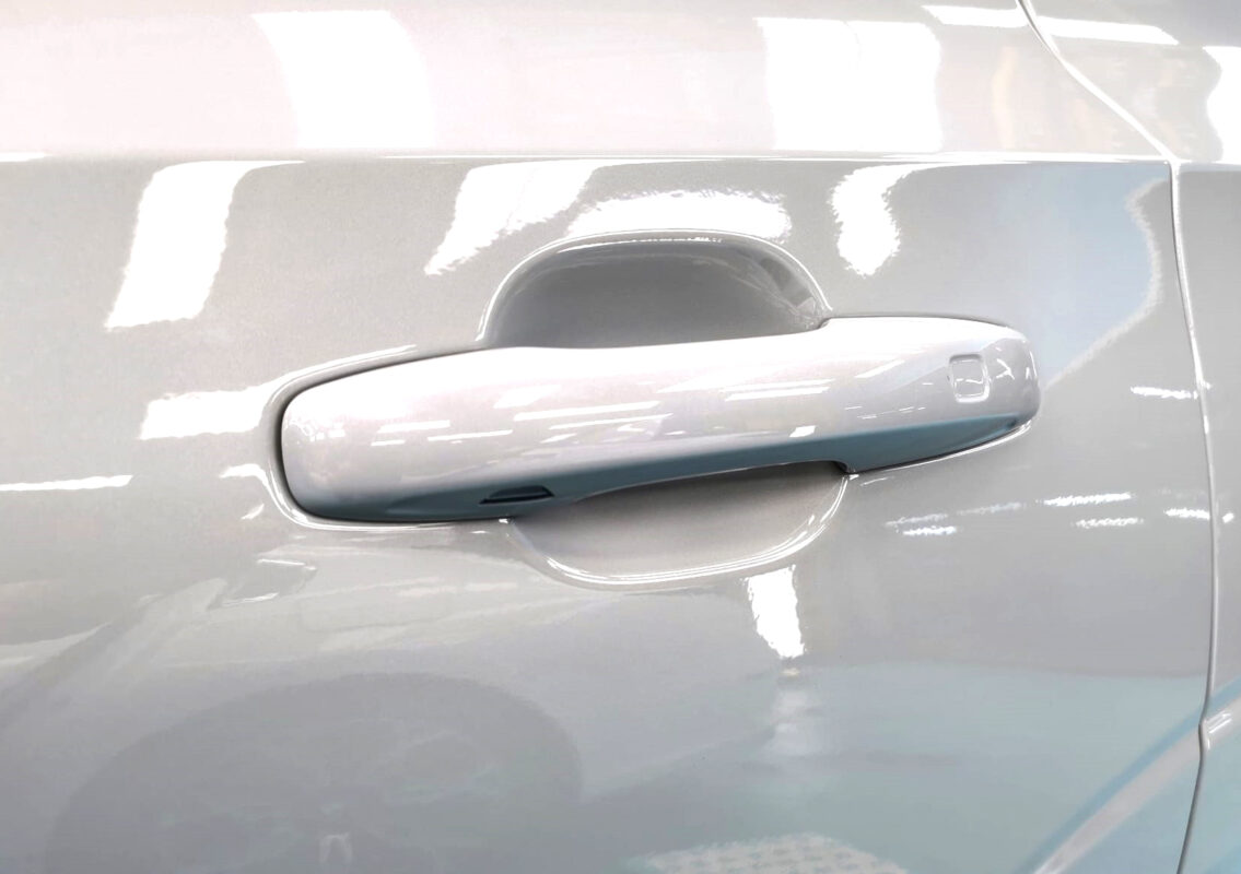 The coated paintwork of the Volvo XC60, clean and sharp.