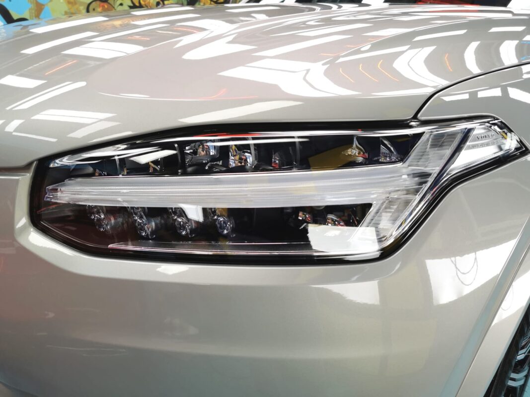 The XC90's coated paintwork showing clean reflections.