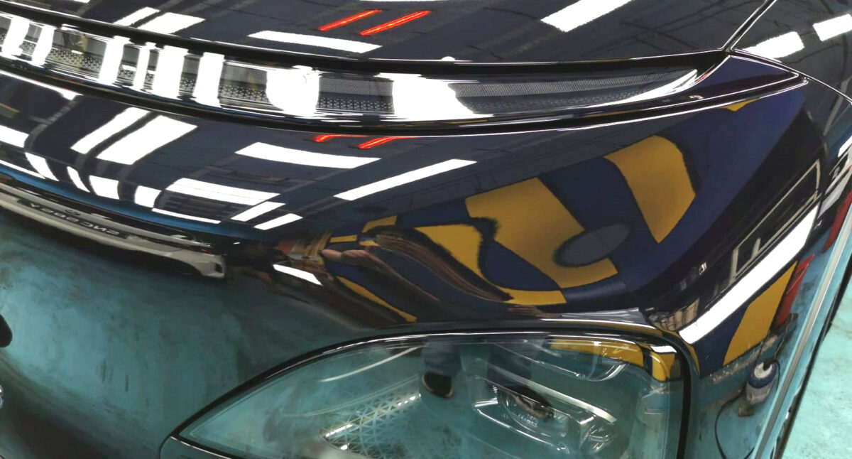Wide angle of the XPeng G6 with the sealed paintwork.