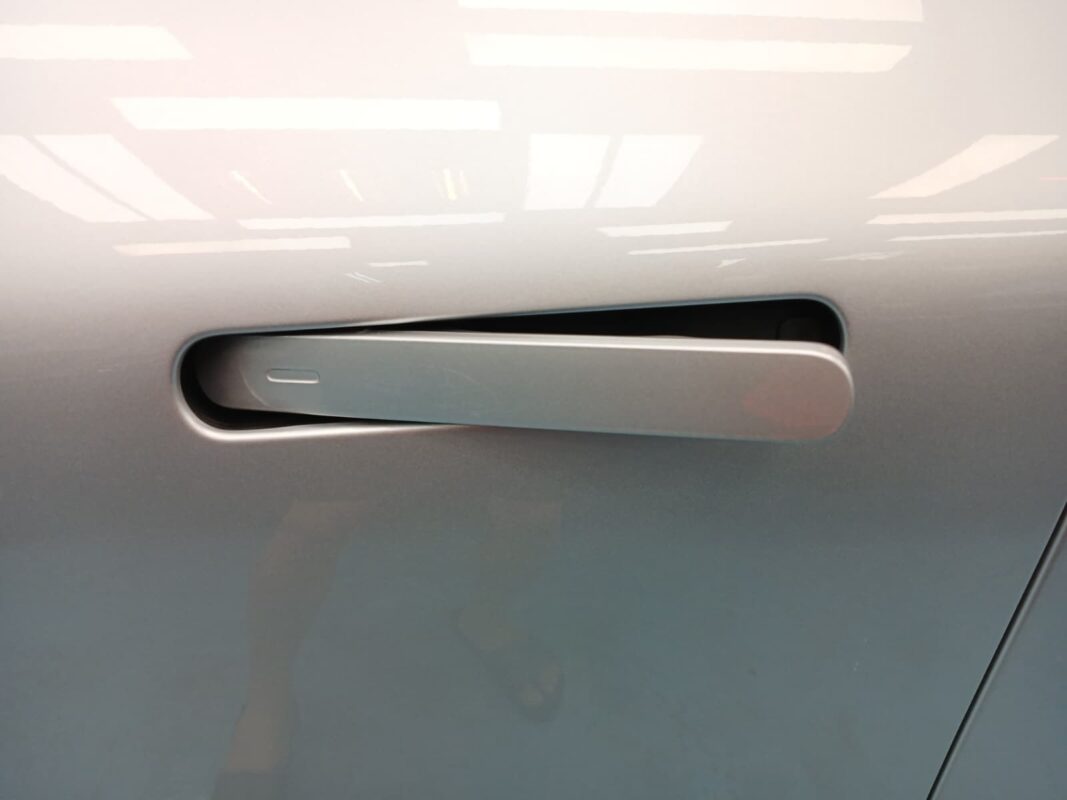 Rear quarter of the XPeng G6, glossy and protected.