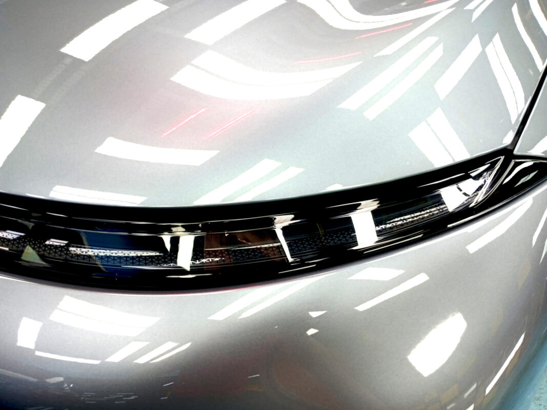The G6 RWD's coated paintwork showing clean reflections.