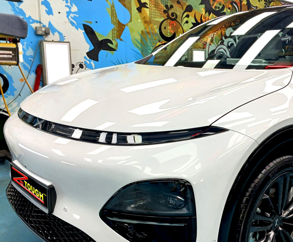 Side angle of the XPeng G6 RWD after the titanium coating.