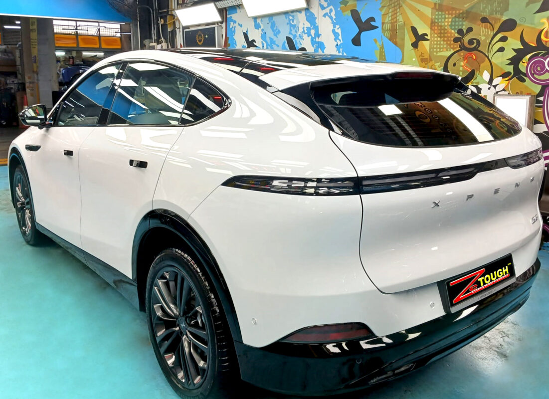 Side panel of the XPeng G6 RWD with the titanium finish locked in.