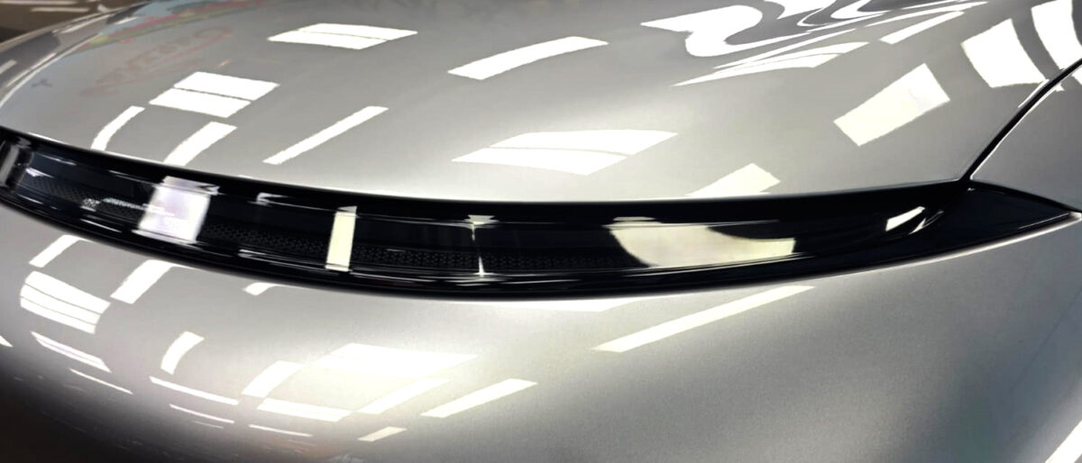 Wide angle of the XPeng G6 with the sealed paintwork.