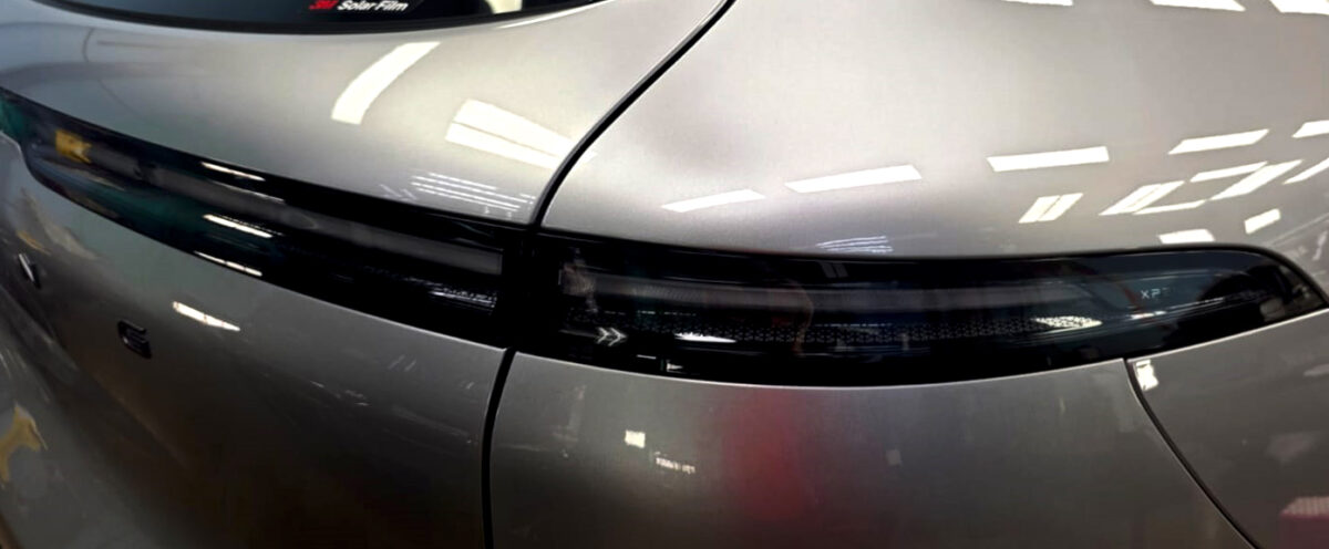 Rear quarter of the XPeng G6, glossy and protected.