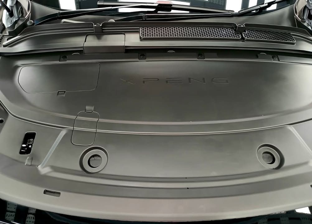 Clean front trunk lid underside and storage area.