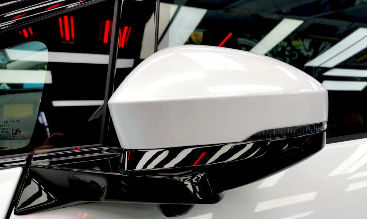 Rear three-quarter view of the XPeng G9 with the coating sealed.
