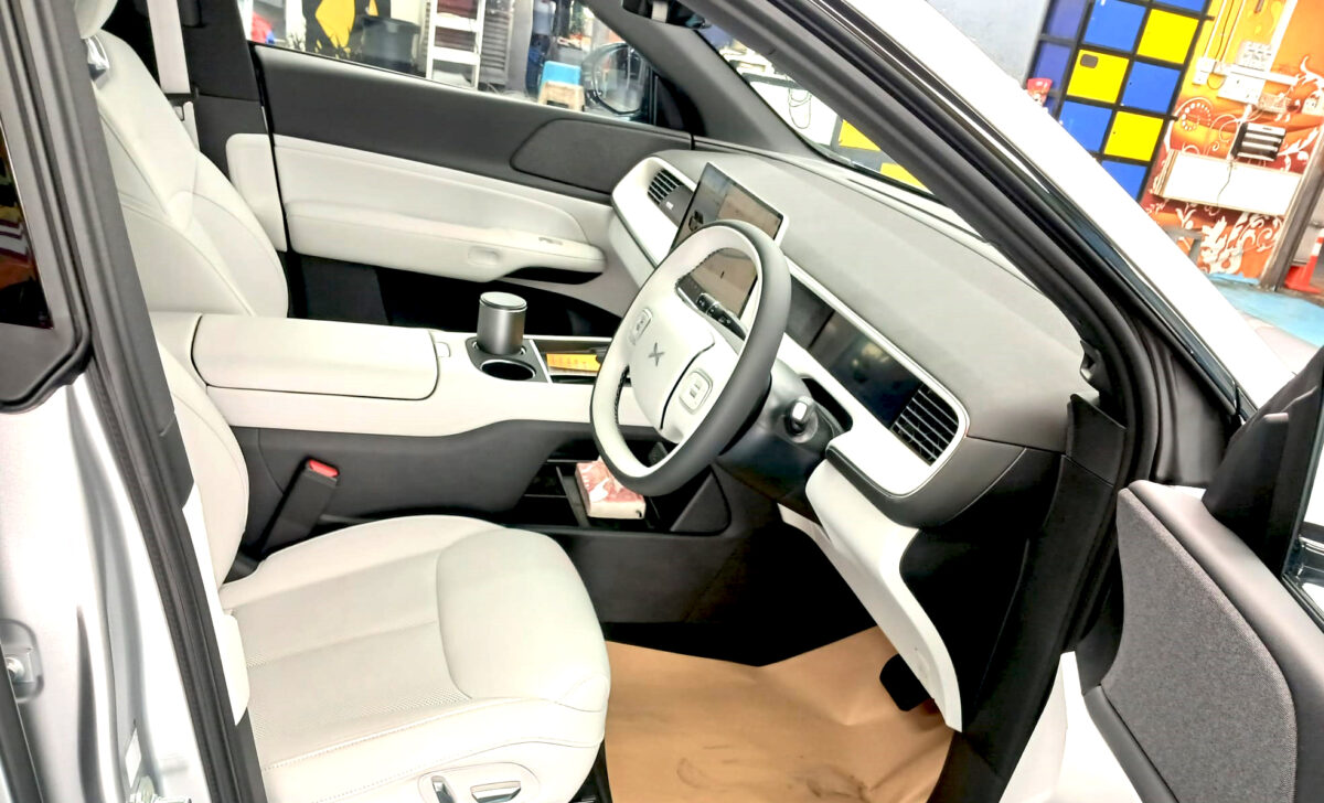 Side panel of the XPeng reflecting clean lines after coating.