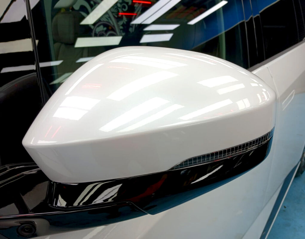 Rear three-quarter view of the XPeng X9 with the coating sealed.