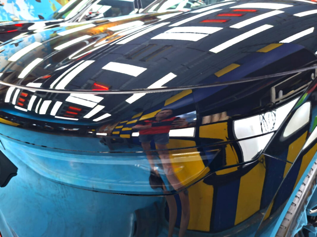 Glossy bodywork of the Zeekr 7X after coating.