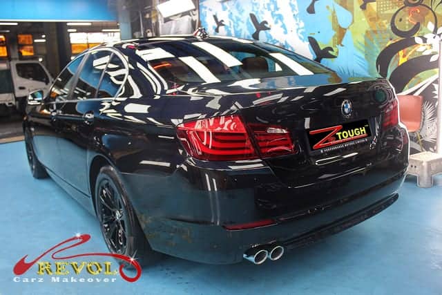 Maintaining Sapphire Black BMW 523i with Paint Protection