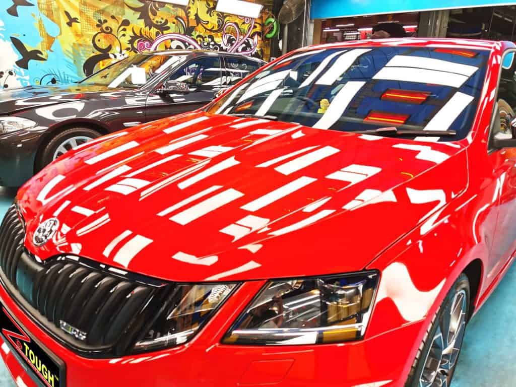 Red Skoda Octavia with its New Ceramic Paint Protection
